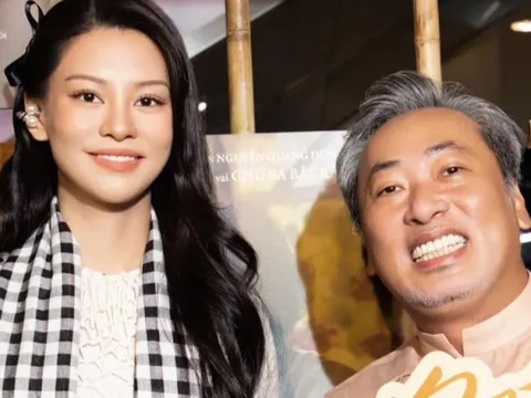 Đạo diễn Nguyễn Quang Dũng công khai nắm tay bạn gái Bùi Lan Hương